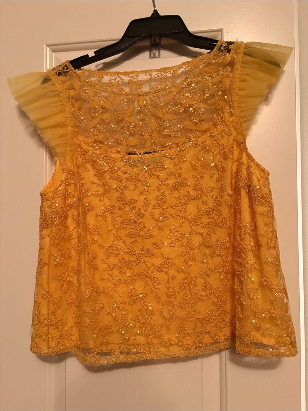 Embellished Yellow Sleeveless Blouse with Sheer Ruffled Cap Details